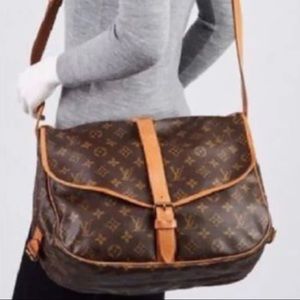 Louis Vuitton Monogram Samur 35 messenger bag.